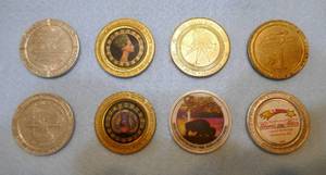 lot 31 image: Group of 18 Dollar Casino coins from Vegas, Iowa, ND, SD