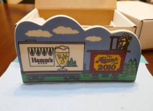 lot 32 image: 2010 Hamms Caboose train ceramic stand - like new in box