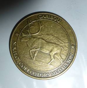 lot 57 image: 50 Caribou and 50 Whitetail Deer collector coins