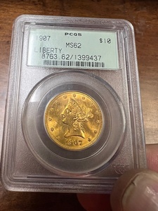 1907 $10 gold Liberty, MS 62 graded by pcgs