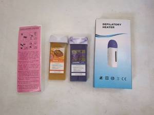 lot 53 image: Depilatory Heater with Honey and Lavender Wax Cartridges and Depilatory Paper
