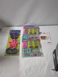 lot 85 image: Lot of Party Supplies Disney Enchanted Silicone Molds, Sunglasses, Balloons