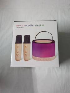 lot 86 image: Smart Portable Speaker with Dual Microphones - Model K52