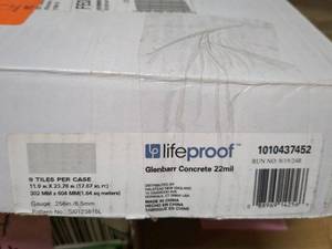 lot 117 image: Case of 9 Lifeproof Concrete 22mil Tiles - 11.9 x 23.78