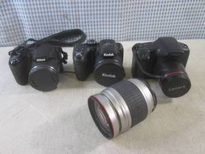 (CS) 3 Cameras and 1 Lens - Nikon C...