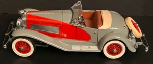 lot 126 image: Danbury Mint 1935 DUESENBERG SSJ Speedster Diecast Car Replica