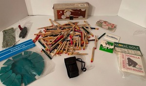 lot 290 image: Vintage Golf Collectibles Including Golf Course Pencils, Ball Marker, Animal Golf Game & More