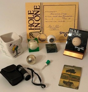 lot 296 image: Vintage Eclectic GOLF mix Including a 14Kt Gold Plated Ball, Hole In One Reward, Golfers Clock, Mug & More