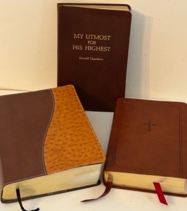 lot 313 image: LEATHER Bound BOOKS Including 2 BIBLES & My Utmost For His Highest by Oswald Chambers