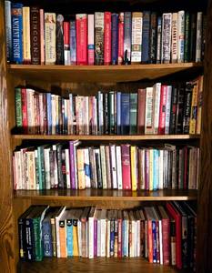 lot 327 image: Four Shelves of Diverse and Collectible Books