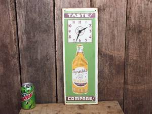 lot 146 image: Old-Look Twinkle Beverages Metal SignClock