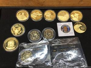 lot 168 image: 13 Trump Coins
