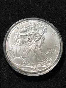 lot 19 image: 2010 AMERICAN SILVER EAGLE 1 TROY OZ .999 FINE SILVER IN AIRTITE