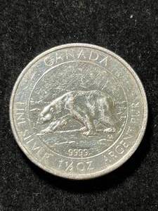 lot 21 image: 2013 CANADIAN POLAR BEAR 1.5 TROY OZ .9999 FINE SILVER