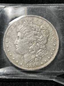 lot 26 image: 1886 US MORGAN SILVER DOLLAR