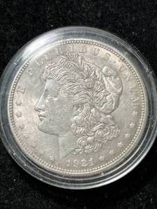 lot 35 image: 1921 US MORGAN SILVER DOLLAR IN AIRTITE