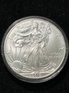 lot 47 image: 2010 AMERICAN SILVER EAGLE 1 TROY OZ .999 FINE SILVER IN AIRTITE