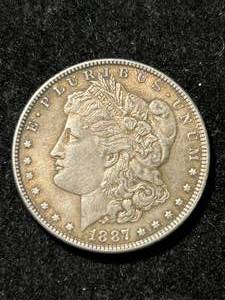 lot 48 image: 1887 US MORGAN SILVER DOLLAR