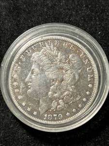 lot 55 image: 1879 US MORGAN SILVER DOLLAR IN AIRTITE