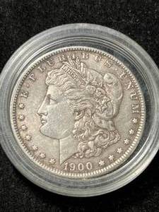 lot 63 image: 1900 US MORGAN SILVER DOLLAR IN AIRTITE