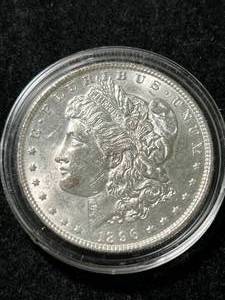 lot 67 image: 1896 US MORGAN SILVER DOLLAR IN AIRTITE