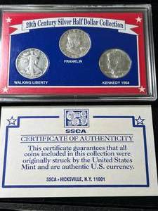 lot 74 image: 20TH CENTURY SILVER HALF DOLLAR 3 COIN SET