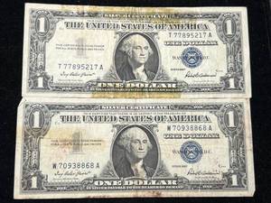 lot 77 image: 2 US 1957 BLUE SEAL $1 SILVER CERTIFICATES