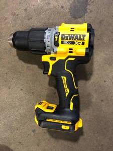 lot 40 image: DEWALT 20V Compact Cordless 12 in. Hammer Drill (Tool Only)    Customer Returns See Pictures