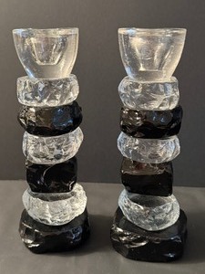 lot 144 image: Pair of Black and White Stacked Glass Candleholders
