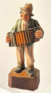 lot 99 image: Vintage German Wooden Hand Carved Accordion Player