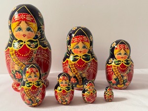 lot 55 image: Seven Piece Russian Stacking Doll Set