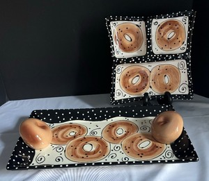 lot 245 image: Two Bagel Motif Platters by Joanne Delomba