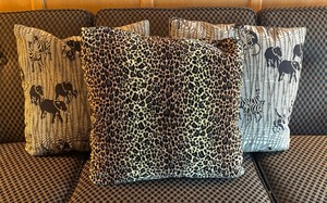 lot 323 image: Three Animal Motif Accent Pillows