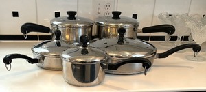 lot 336 image: Farberware and Revere Ware Pots and Pans with Lids