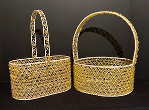 lot 359 image: Two White Baskets with Yellow Beads