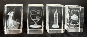 lot 315 image: Four Etched Hologram Paperweights  Happy Birthday, Empire State Building, Golf and Love