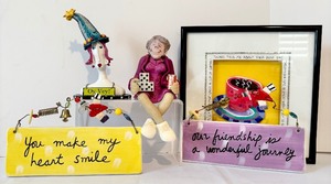 lot 306 image: Fun Decor including Small Shadow Picture by Michelle Samara, Ceramic Hanging with Saying by Silvestri, Oy Vey by Bustline and More