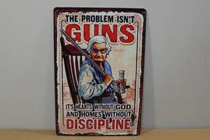 Novelty Metal Sign -Guns