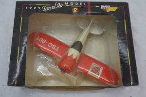 lot 13 image: Diecast Airplane bank. 1929 Travel Air Model R