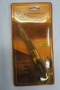 lot 28 image: Appalachian Trail. 3 In. Lock Back Bone Handle Knife. Rust-resistant stainless steel blade.