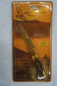 lot 29 image: Appalachian Trail. 3 In. Lock Back Bone Handle Knife. Rust-resistant stainless steel blade.