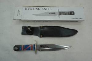 lot 39 image: Hunting Knife. NEW IN BOX. 7 blade with sheath.