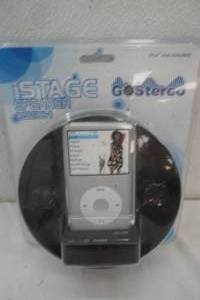 lot 59 image: iStage Speaker. CQL1081. NEW IN PACKAGE. 3.5mm input jack. 4AA batteries or AC 6V adapter.