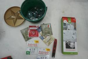 lot 85 image: Anchor stakes and rope, light-bulb tester and extra bulbs