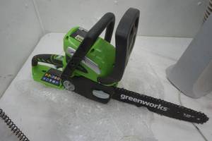 lot 105 image: Greenworks G-MAX 40V lithium 12 chainsaw model # 20292