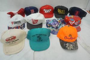 lot 215 image: 12 caps, including Crown Royal, Mn Twins vintage cap and others