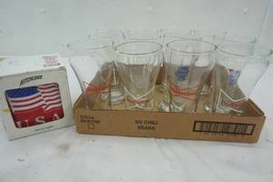 lot 216 image: A dozen Pabst and Budweiser beer glasses plus a USA hitch art
