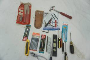 lot 303 image: hardware lot. mini hammer, rivet set, jig saw blades.