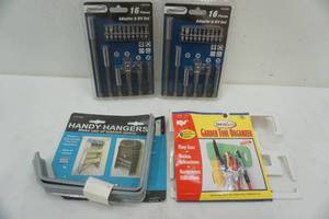 lot 308 image: NEW in package. 2 drill bit and adapter sets, handy hangers, garden tool organizer