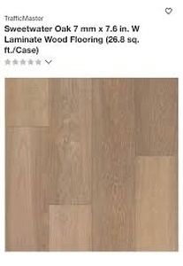 lot 106 image: 5 Boxes of TrafficMASTER Sweetwater Oak Laminate Flooring - 10 Pieces per Box